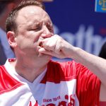 Hot dog eating champ banned over vegan deal