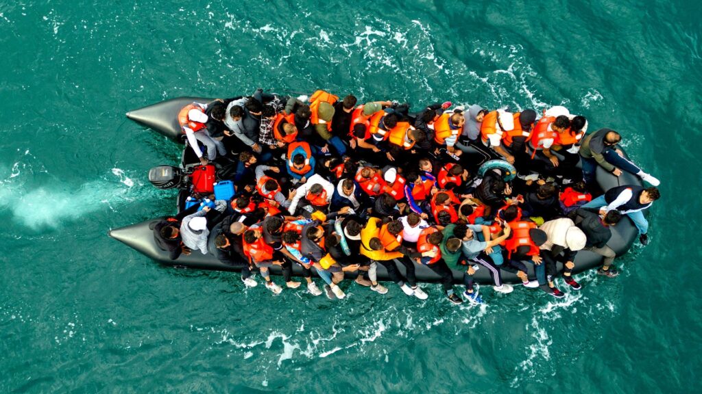 Almost all those who arrived on a small boat in last year still waiting for asylum decision