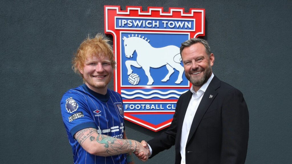 Ed Sheeran buys stake in Ipswich Town – and celebrates with tractor ride