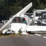 Light aircraft lands on main road