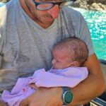 Baby rescued after being stranded on island for days