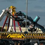 People stuck mid-air after amusement park ride malfunctions