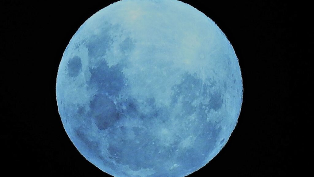 In pictures: Blue supermoon lights up sky around the world