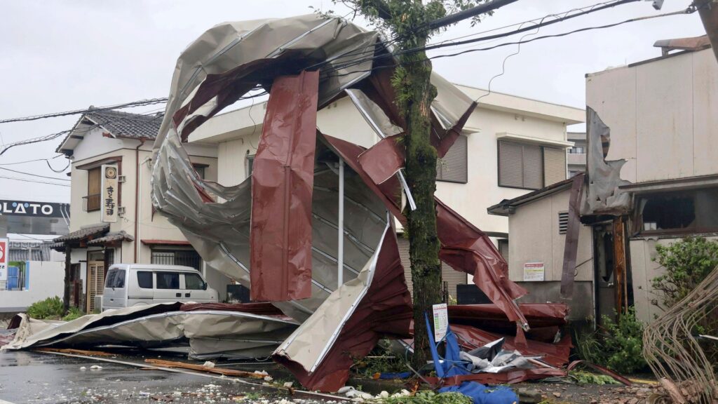 At least three dead as typhoon hits Japan and raises fears of flooding and landslides