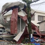 At least three dead as typhoon hits Japan and raises fears of flooding and landslides