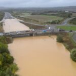 Floods trigger travel disruption – as fresh weather warning issued