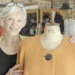 Fashion designer reunited with long-lost garment after charity shop find