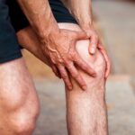 Tiny knee bone linked to arthritis may have helped humans walk upright, scientists suggest