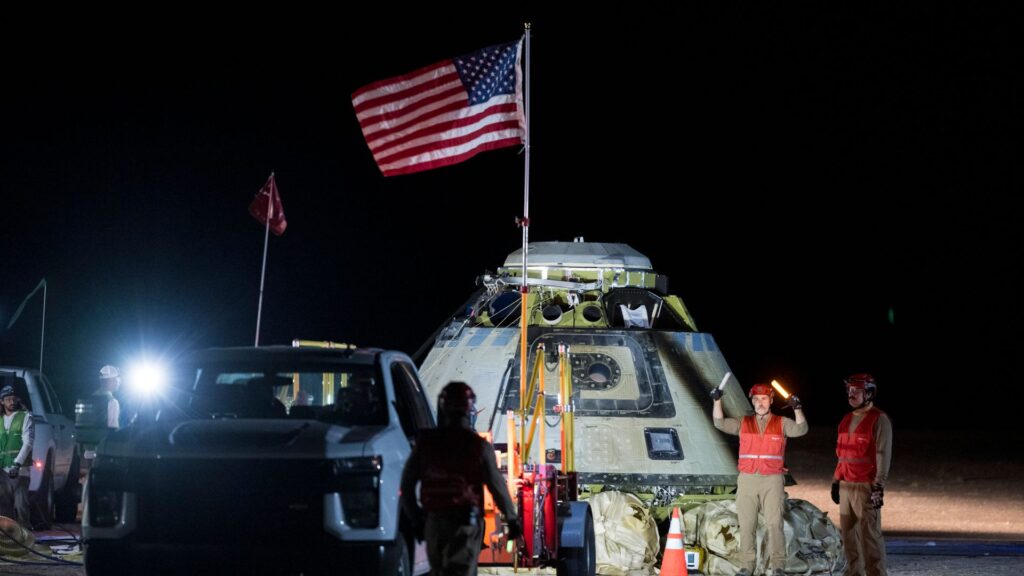 Troubled spacecraft lands back on Earth – but leaves astronauts behind