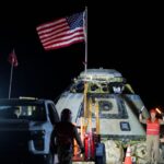 Troubled spacecraft lands back on Earth – but leaves astronauts behind