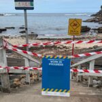 Mystery tar balls wash up on Sydney beaches forcing seven to close