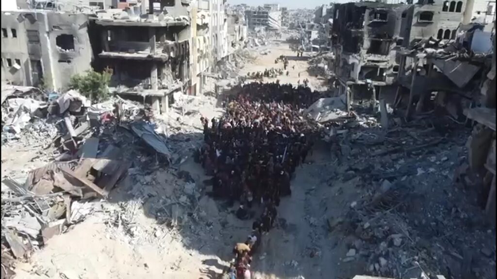 Video shows hundreds queueing to flee in Gaza – as UN aid chief warns of ‘bodies left on street’