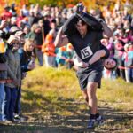 Mud, beer and cash: Annual wife-carrying championship takes Maine by storm