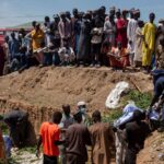 Mass burial after more than 140 killed scavenging fuel from overturned petrol tanker