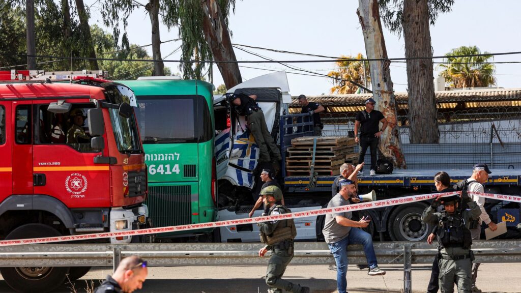 One killed after truck rams bus stop near Tel Aviv – as Iranian leader responds to Israeli strikes