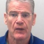 Gang boss who ran arms cache plot from prison jailed