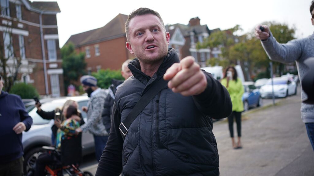 Tommy Robinson admits contempt of court after repeating false allegation about Syrian refugee