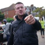 Tommy Robinson admits contempt of court after repeating false allegation about Syrian refugee