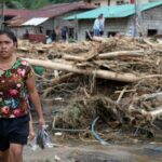 More than 120 killed and dozens injured after tropical storm batters Philippines