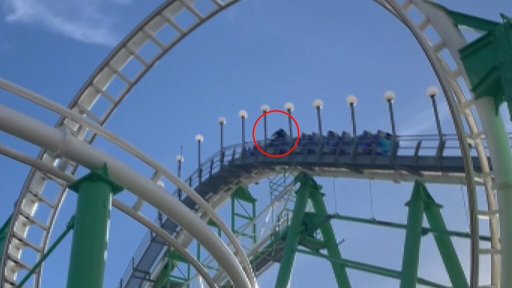 ‘I had mere seconds to act’: Video shows man climbing out of US rollercoaster after safety bar scare