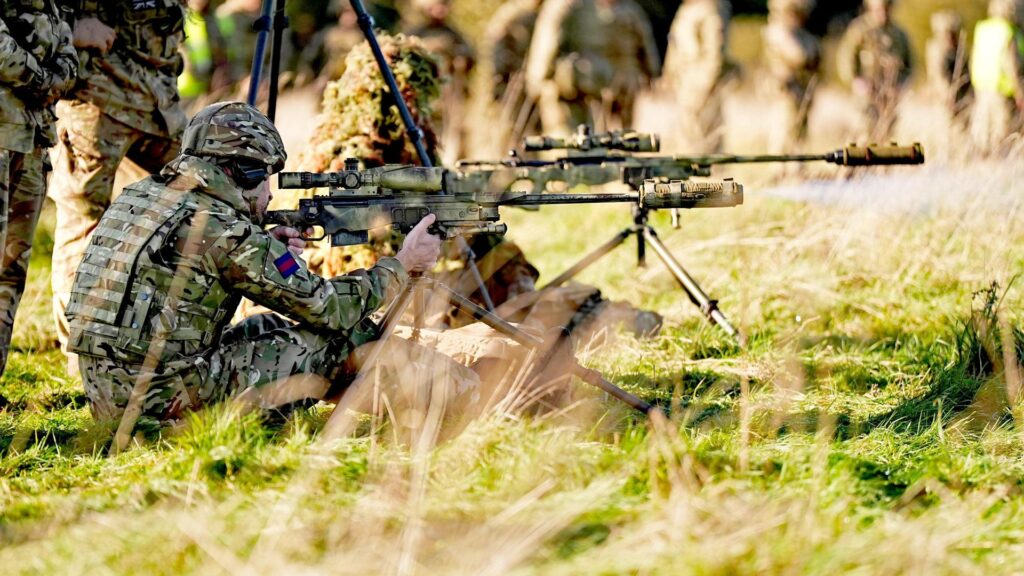 Prince William flies drone and fires sniper rifle as he joins military training exercise