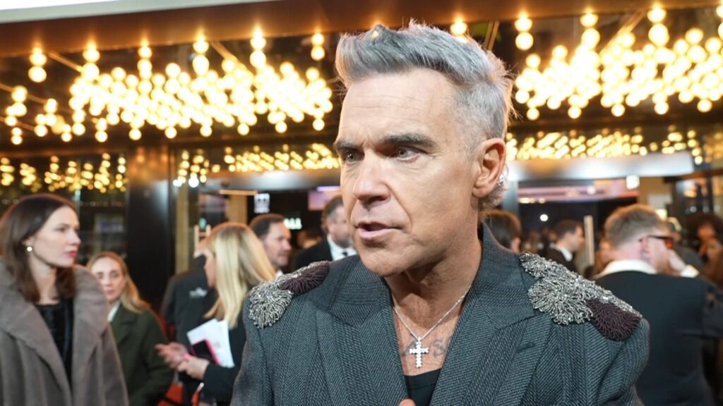 Robbie Williams says people from the 90s shouldn’t be shamed for how they think and feel