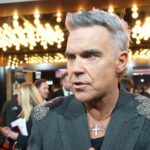 Robbie Williams says people from the 90s shouldn’t be shamed for how they think and feel