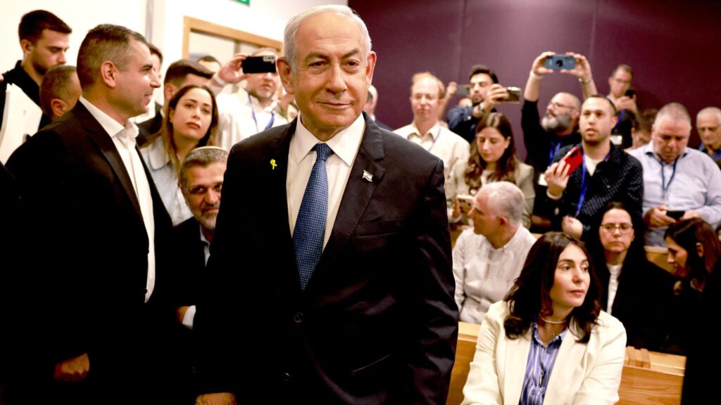 Netanyahu gives evidence in fortified courtroom as he calls corruption claims ‘absurd’