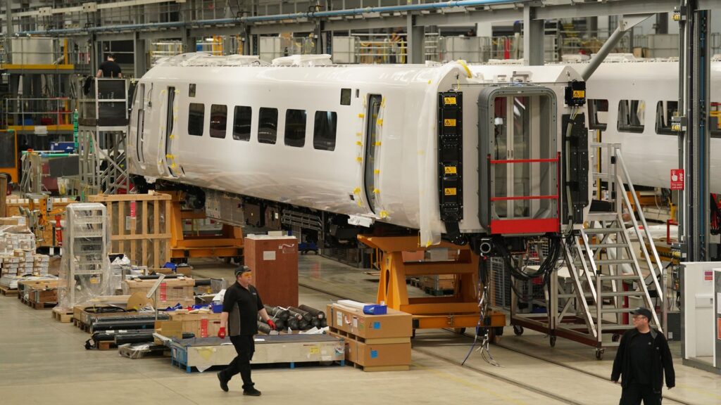 Hundreds of jobs secured at train factory after £500m deal