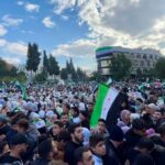 Syrians celebrate ‘Victory Day’ – but are nervous about what comes next