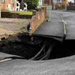 Large sinkhole opens up in South Wales as residents told to stay away