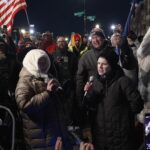 ‘Thank you, Mr Trump’: Supporters of jailed Capitol rioters gather outside prison to await their release