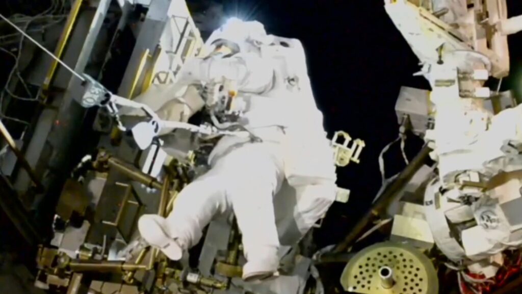 NASA’s stuck astronaut steps out for spacewalk