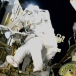 NASA’s stuck astronaut steps out for spacewalk