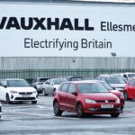 Car maker meets electric vehicle target despite criticising the goal and closing its Luton plant