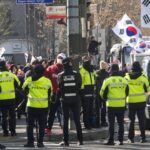 South Korea president to appear at hearing as thousands of supporters gather near court