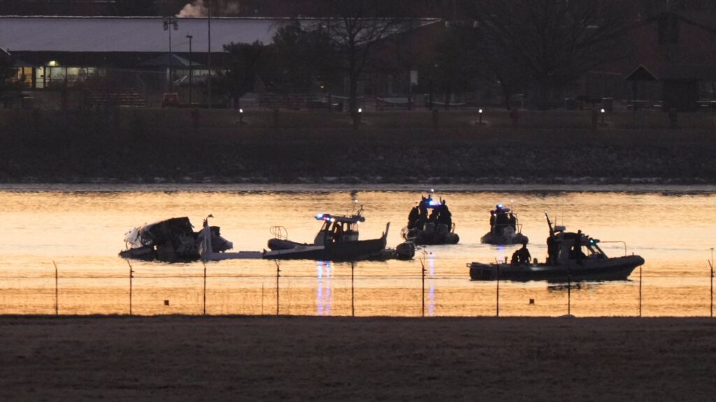 American Airlines jet found upside down and in three pieces after mid-air collision