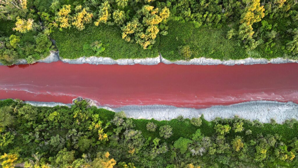 River in Argentina turns bright red