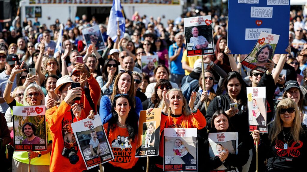 ‘He has left hell’: Israelis welcome home hostages after 15 months in Gaza