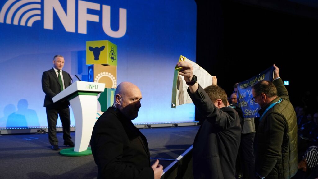 Protesters interrupt environment secretary’s speech to farmers’ conference