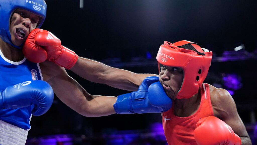 Boxer who won refugee team’s first-ever Olympic medal turns pro after UK citizenship rejection